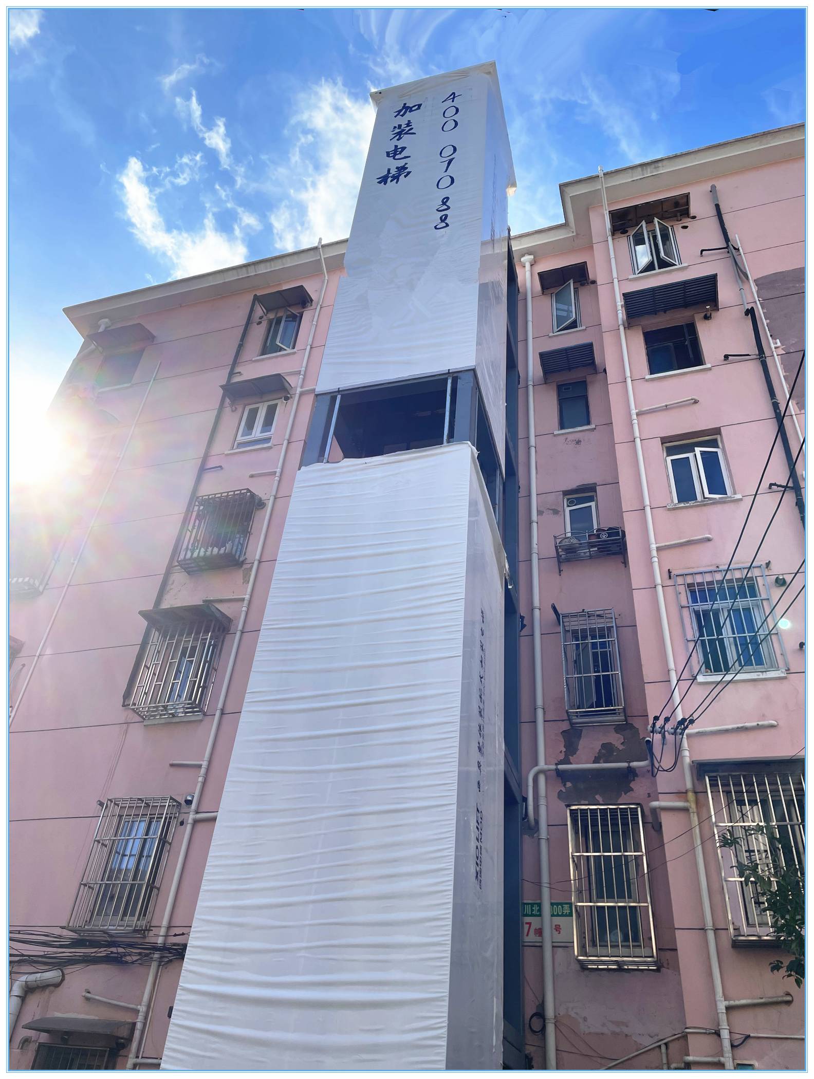 老公房的春天来了，上海今年目标加装1000台电梯